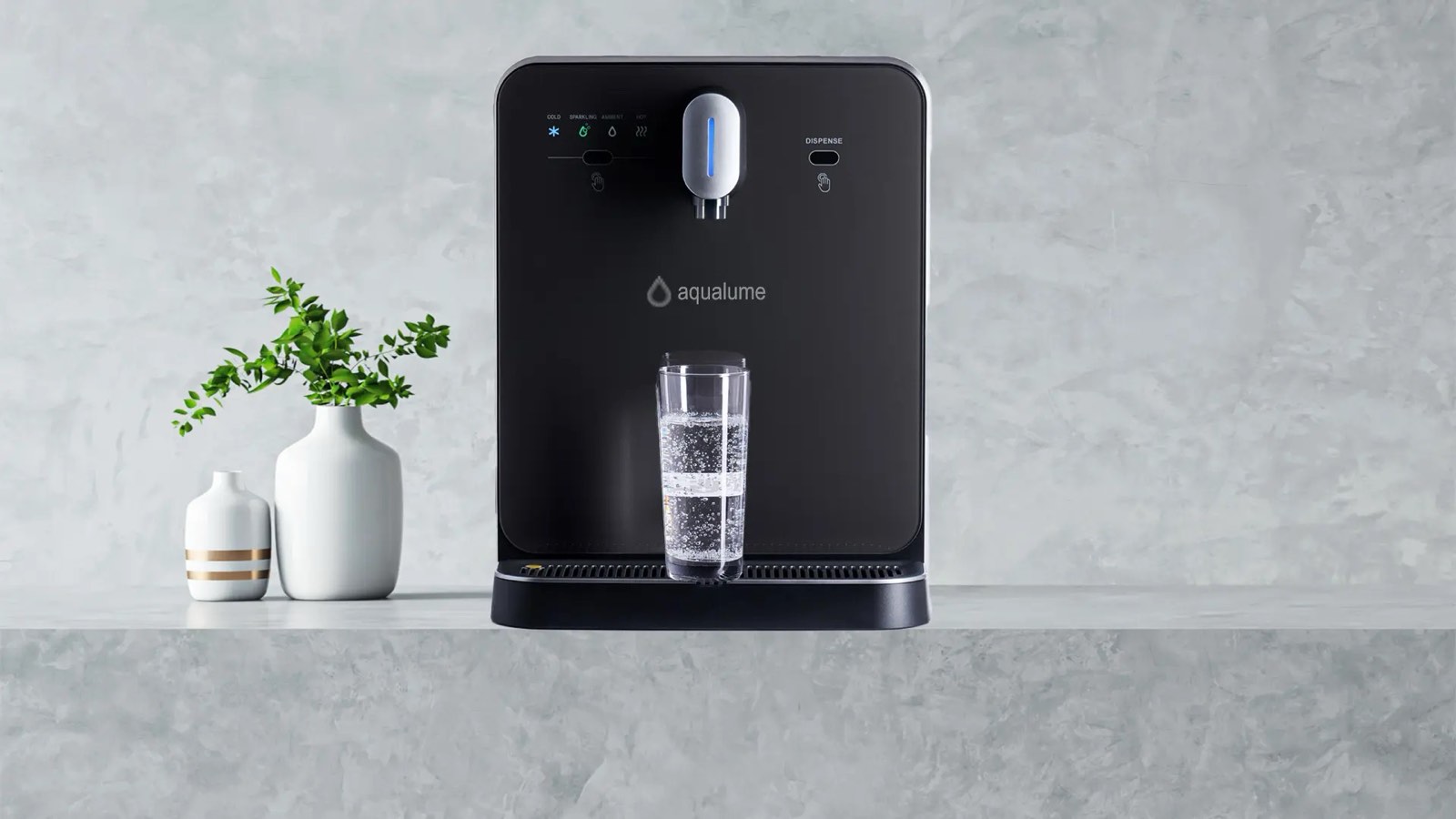 Aqualume compact tabletop water dispenser on a counter